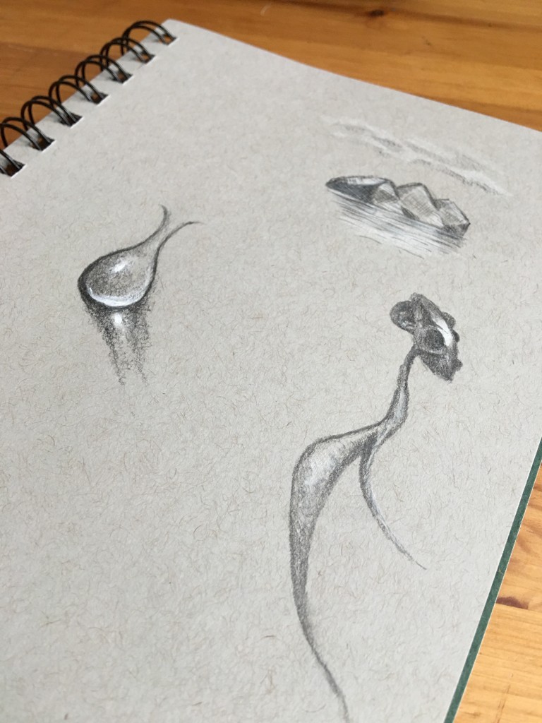 gray paper with white pencil